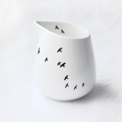 White milk jug with bird print