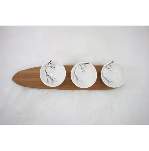 Three white branch snack bowls with wooden tray