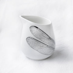 White milk jug with dragonfly print