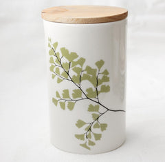 White storage jar with wooden lid