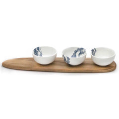 Three white snack bowls with blue mineral print and wooden tray