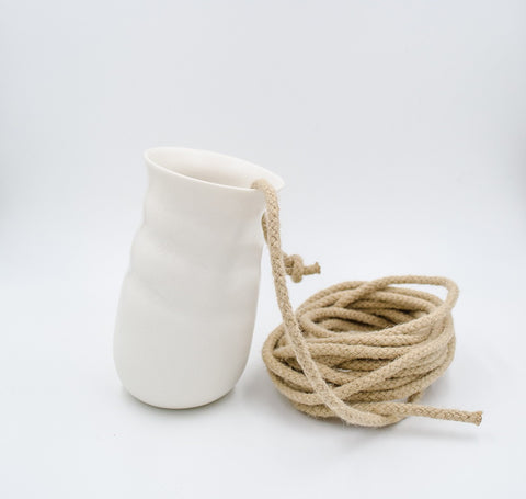 White porcelain hanging vase