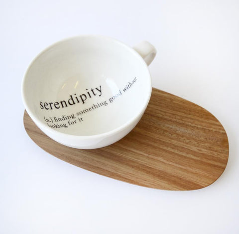 tea cups with message and wooden saucer